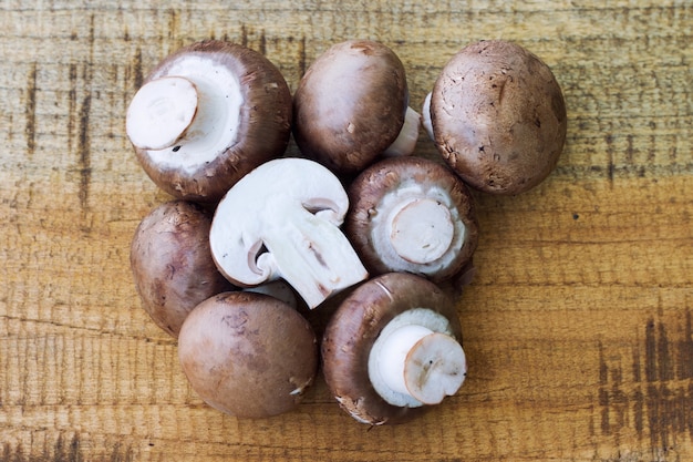 fresh mushrooms on wodden background