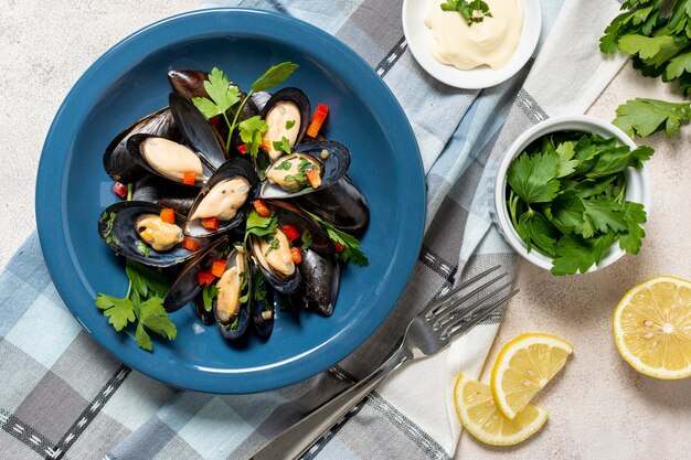 Fresh mussel shells with lemon slices