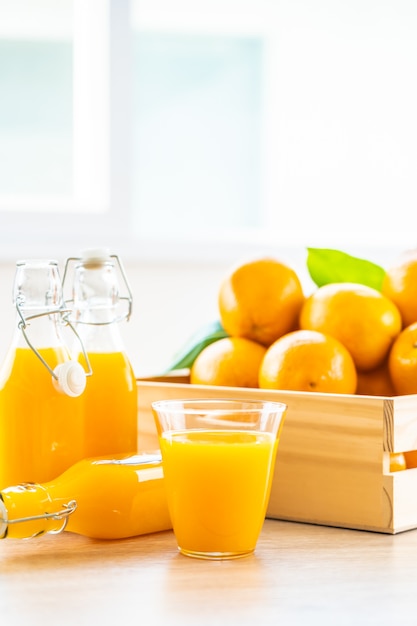 Free photo fresh orange juice for drink in bottle glass