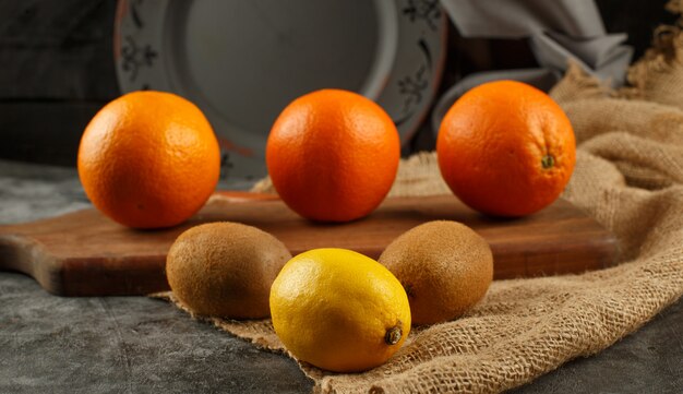 Fresh oranges, kiwies and lemon.