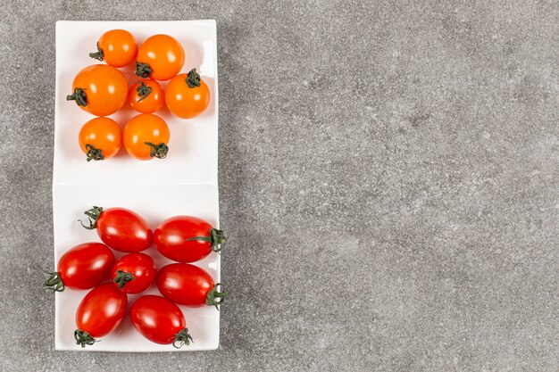 Fresh organic cherry tomatoes. Red and yellow.