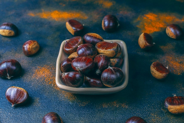 Free photo fresh organic chestnuts.