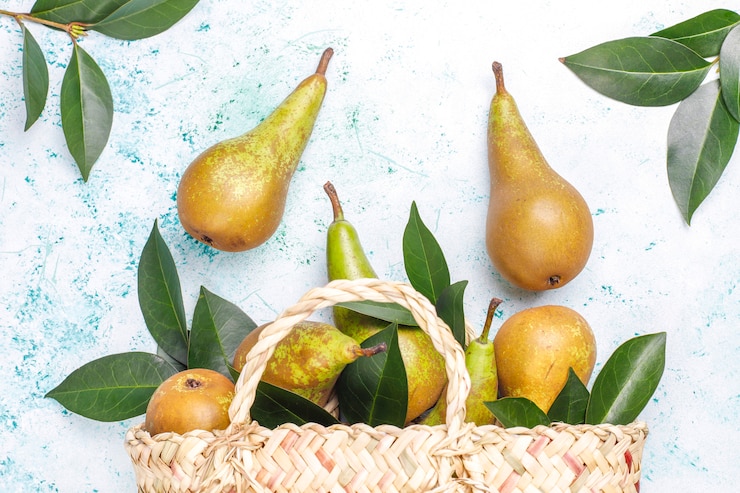 Free Photo fresh organic farm fruits, pears, quince, top view