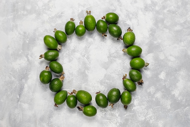 Free photo fresh organic feijoas on light