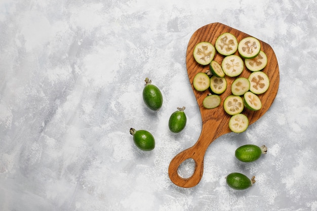 Free photo fresh organic feijoas on light