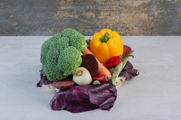 Fresh organic vegetables on stone table. High quality photo