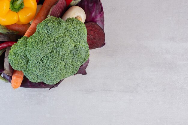 Fresh organic vegetables on stone table. High quality photo