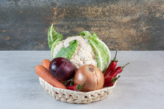 Fresh organic vegetables in wooden basket. High quality photo