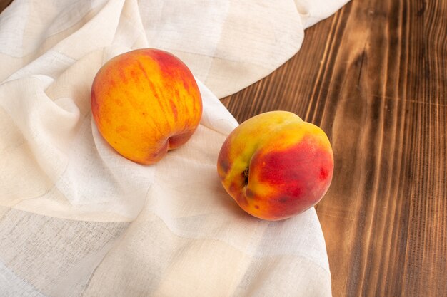 fresh peaches on wood