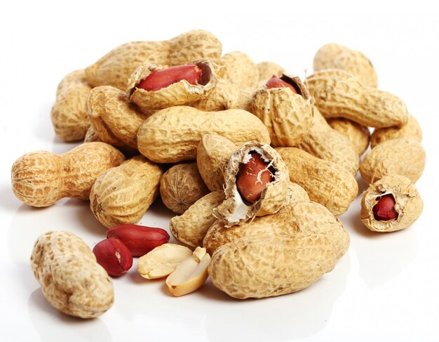 fresh peanuts on white