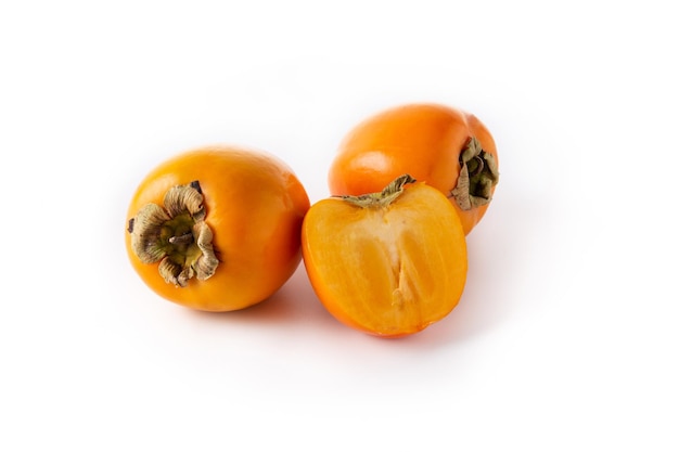 Fresh persimmon fruit isolated on white background