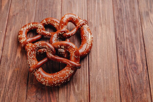 Fresh pretzel sprinkled with sesame seeds