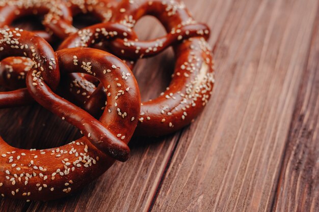 Fresh pretzel sprinkled with sesame seeds