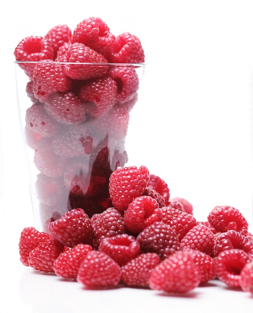 Fresh raspberries in the glass