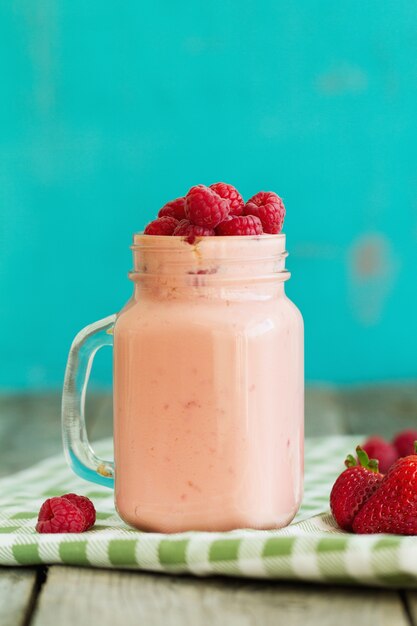 Fresh raspberry smoothie in glass