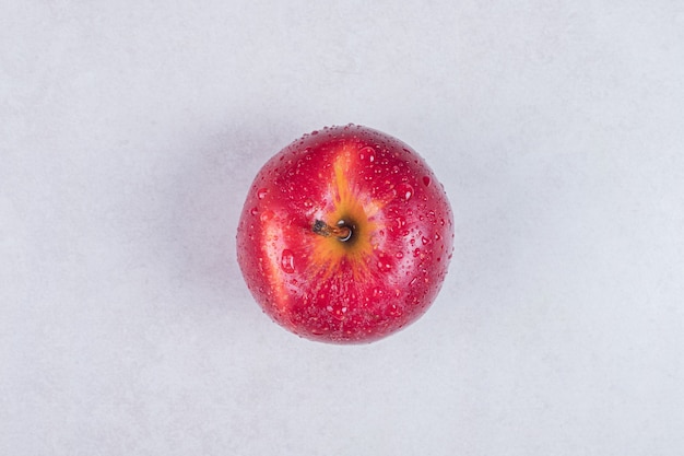 Fresh red apple on white background.