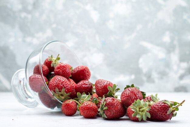 fresh red strawberries inside and outside plate on white , fruit berry fresh mellow photo