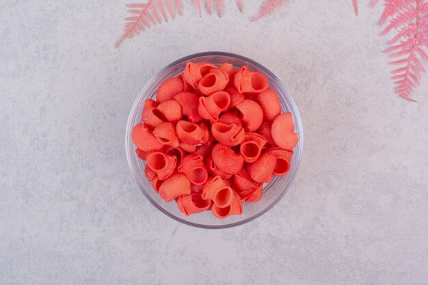 Fresh red uncooked on glass plate on white surface