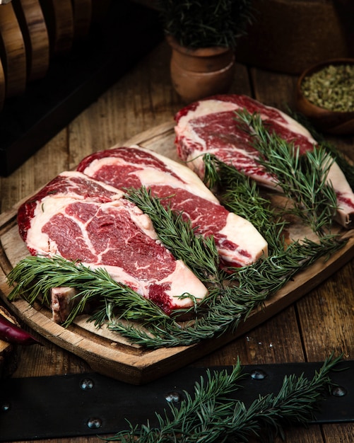 Fresh rib eye steaks on the table