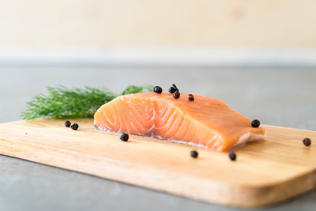 Free photo fresh salmon fillet on board