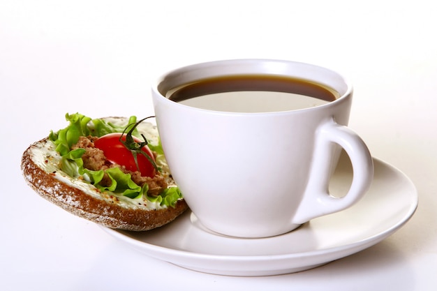 Fresh sandwich with fresh vegetables and coffee