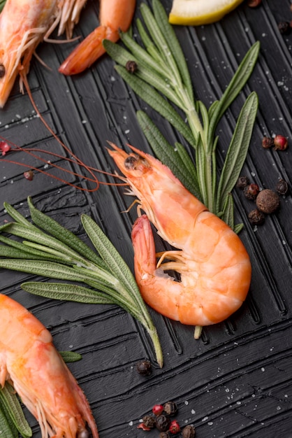 Free photo fresh seafood shrimp and herbs