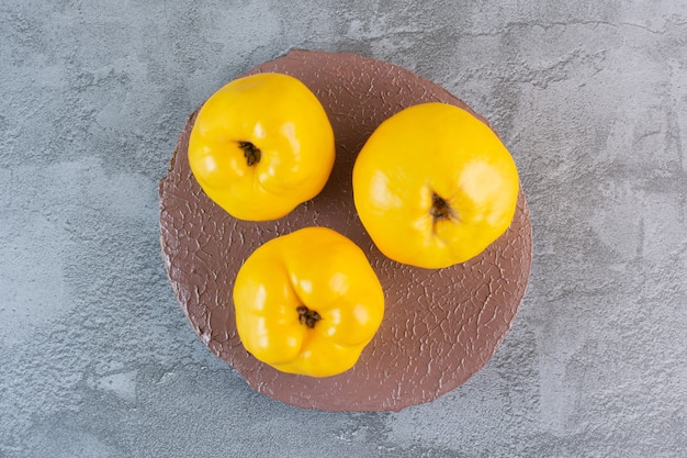 Free photo fresh season fruits. top view of organic apple quince.