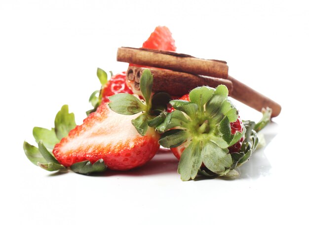 Fresh strawberries and cinnamon sticks