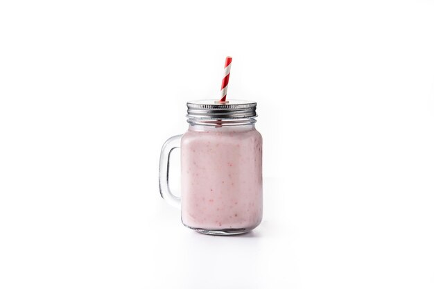 Fresh strawberry and banana smoothie in jar isolated on white background