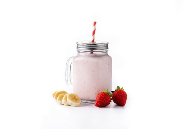 Fresh strawberry and banana smoothie in jar isolated on white background