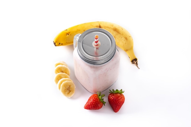 Fresh strawberry and banana smoothie in jar isolated on white background