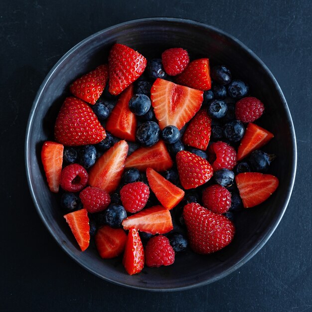 Fresh summer berries on plate. Square.