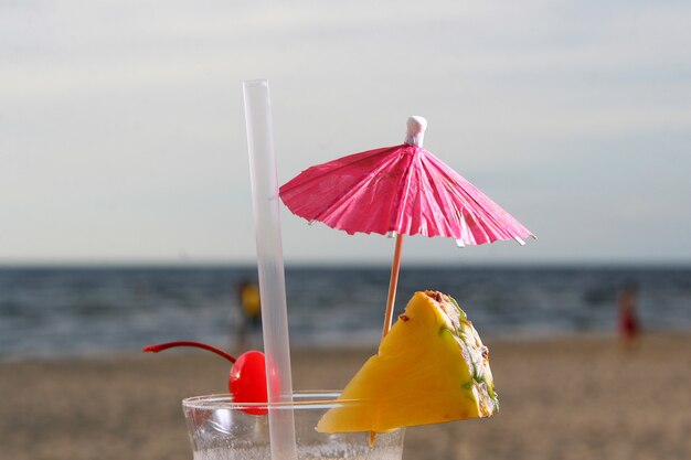 Fresh summer cocktail with dessert cherry and watermelon