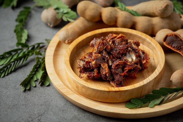 Free photo fresh sweet ripe tamarind on dark surface