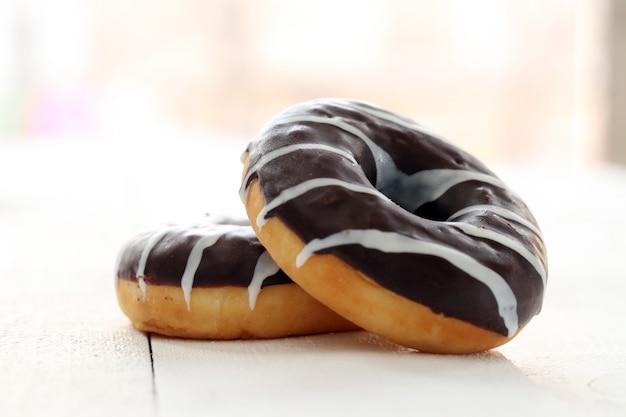 Fresh tasty donuts with brown glaze