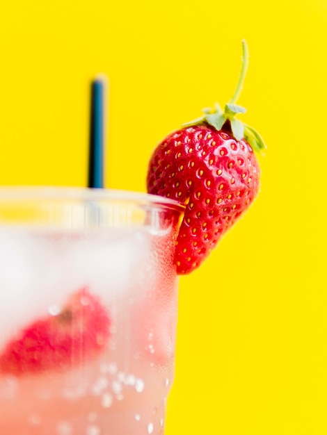 Fresh tasty strawberry in cocktail glass