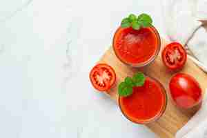 Free photo fresh tomato juice ready to serve