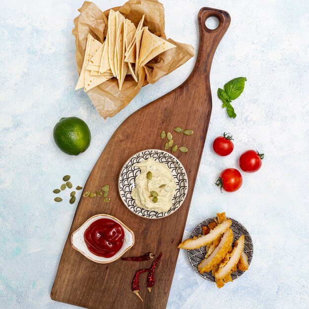 Fresh tortilla with dips and fried chicken