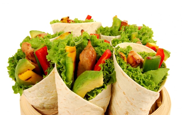 Free photo fresh tortillas wraps with chicken and avocado