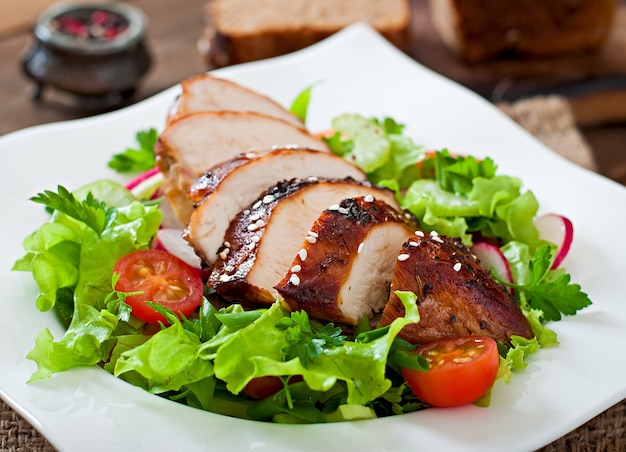 Fresh vegetable salad with grilled  chicken breast.