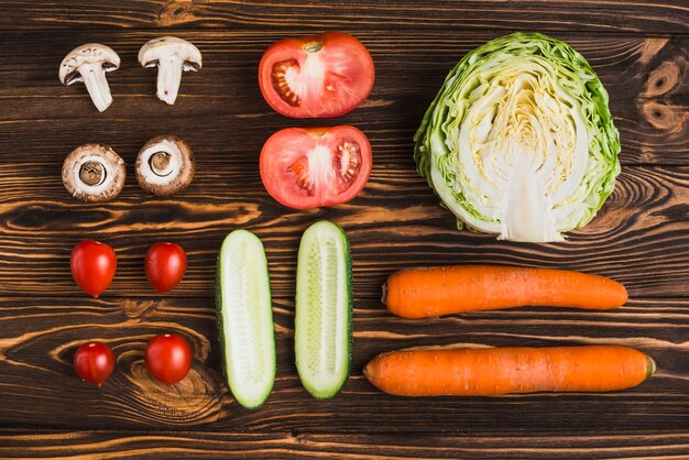 Fresh vegetables composition on wooden table