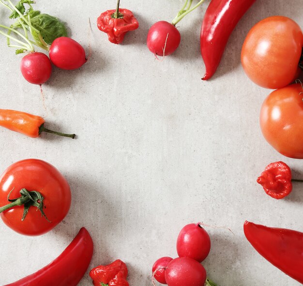 Fresh vegetables on gray surface