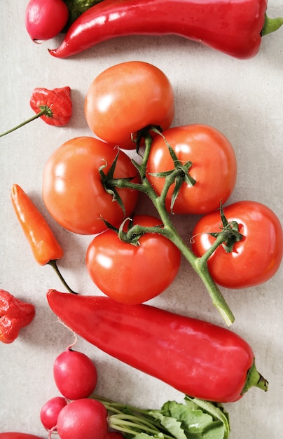 Fresh vegetables on gray surface