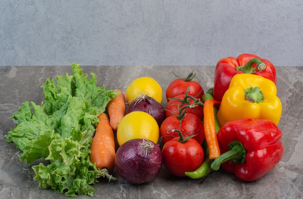 Free photo fresh vegetables on marble background. high quality photo