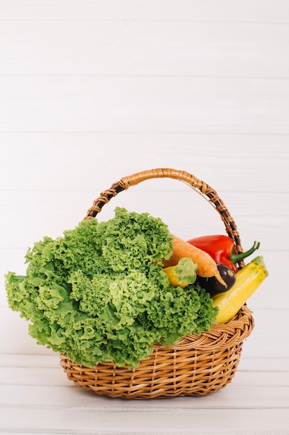 Fresh vegetables pile in basket