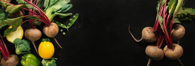 Fresh vegetables placed on dark table