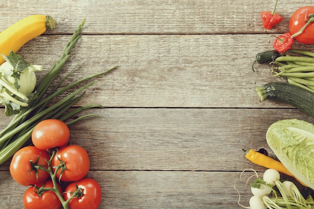 Fresh vegetables on wooden table