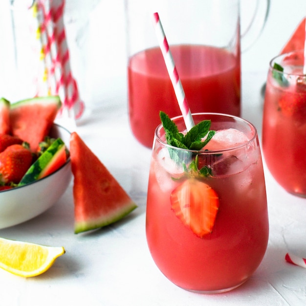 Fresh watermelon strawberry lemonade cocktail with mint