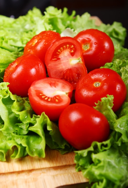 Free photo fresh and wet tomatoes