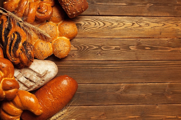 Freshly baked bread on wooden table